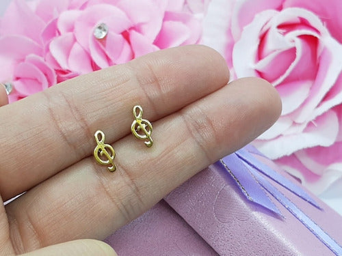 Brinco Infantil Dourado Aço Cirúrgico Música Tarraxa Baby